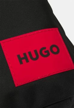 HUGO ETHON MONOSTRAP UNISEX - Across Body Bag - Black -HUGO Shop 4ffd983dec4e4496a392995eb38329a3