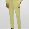 HUGO DHOENYX - Tracksuit Bottoms - Light Yellow