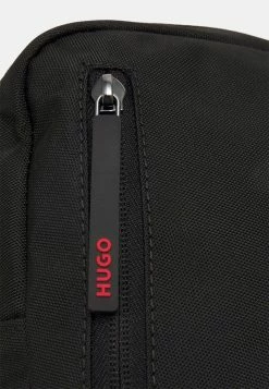HUGO ETHON MONOSTRAP UNISEX - Across Body Bag - Black -HUGO Shop 8a7eadfb42394489ac7407e62ffa71b1