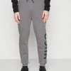 HUGO DARLOWE - Tracksuit Bottoms - Open Grey